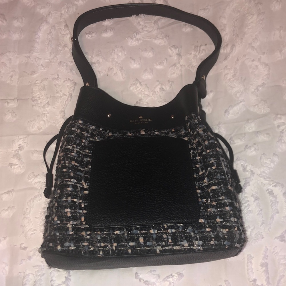 Kate spade black and blue with some white bucket  bag with adjustable strap